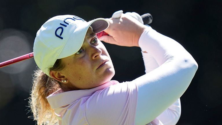 Lauren Coughlin, of USA, plays on the fourth hole during the last round of the Evian Championship women's golf tournament, in Evian, eastern France, Sunday, July 14, 2024. (AP Photo/Laurent Cipriani)