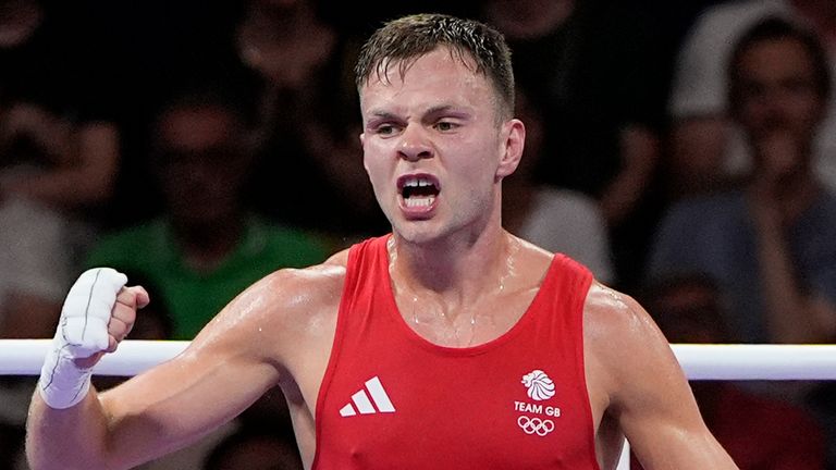 Britain's Lewis Richardson celebrates after defeating Serbia's Vakhid Abbasov in their men's 71 kg preliminary boxing match at the 2024 Summer Olympics, Wednesday, July 31, 2024, in Paris, France. (AP Photo/John Locher)