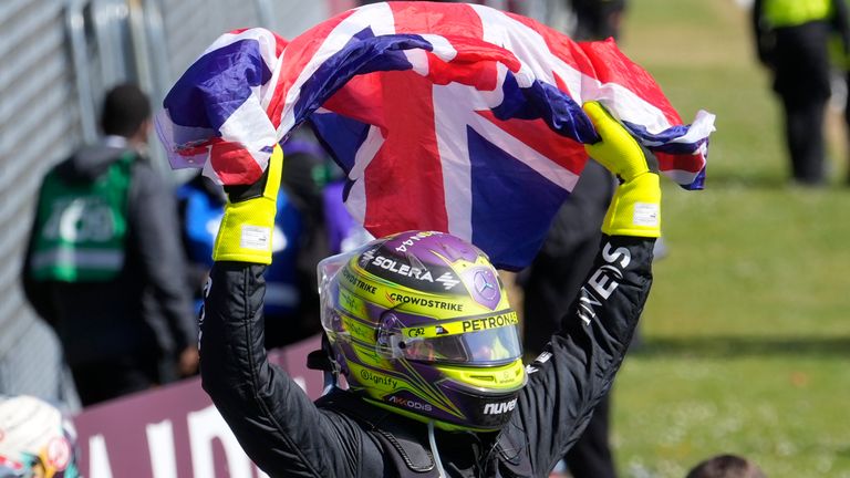 Mercedes driver Lewis Hamilton of Britain celebrates after winning the British Formula One Grand Prix race at the Silverstone racetrack, Silverstone, England, Sunday, July 7, 2024. (AP Photo/Luca Bruno)