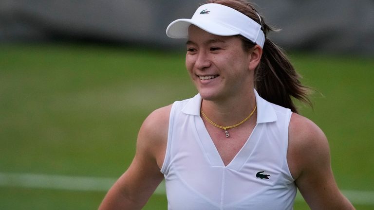 Lulu Sun of New Zealand reacts after defeating Yuliia Starodubtseva of Ukraine in her match on day three of the Wimbledon tennis championships in London, Wednesday, July 3, 2024. (AP Photo/Mosa'ab Elshamy)