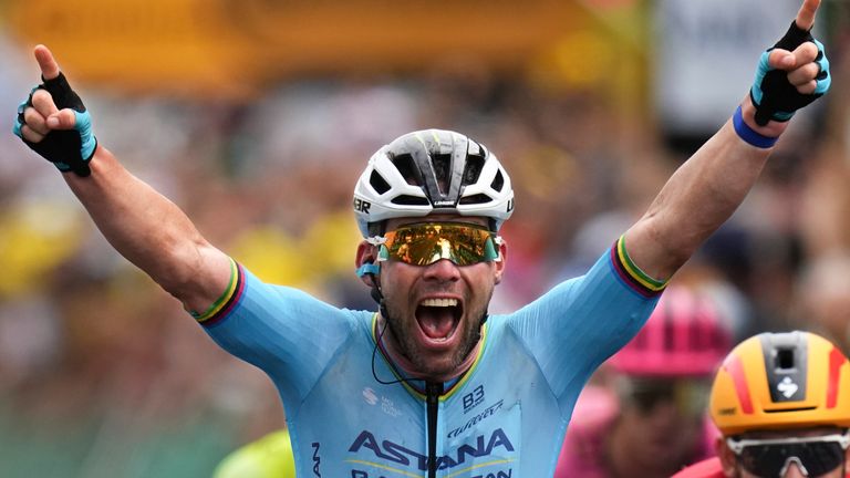 Britain's sprinter Mark Cavendish crosses the finish line for a record 35th Tour de France stage win, breaking the record of Belgian legend Eddy Merckx, in the fifth stage of the Tour de France cycling race over 177.4 kilometers (110.2 miles) with start in Saint-Jean-de-Maurienne and finish in Saint-Vulbas, France, Wednesday, July 3, 2024. (AP Photo/Daniel Cole)