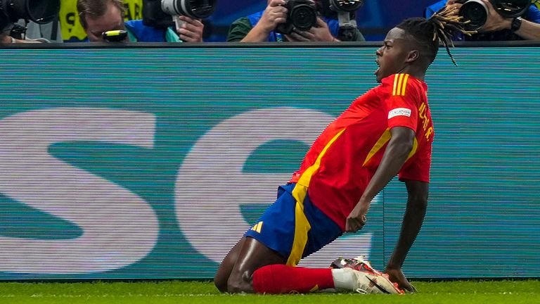 Spain's Nico Williams celebrates after scoring the opening goal during the final match against England at the Euro 2024 soccer tournament in Berlin, Germany, Sunday, July 14, 2024. (AP Photo/Martin Meissner)