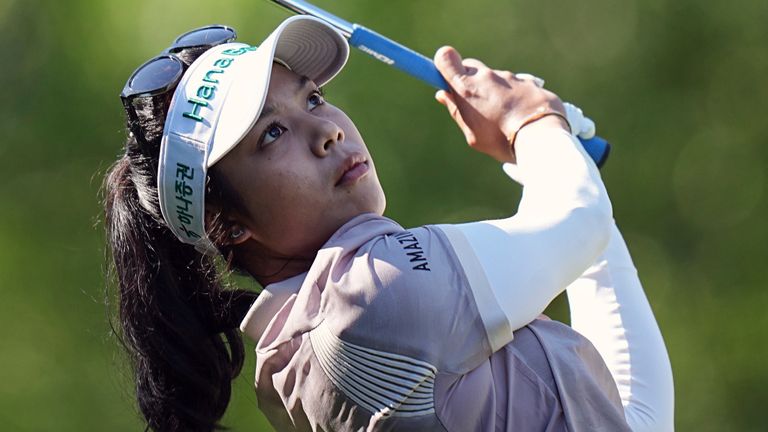 Patty Tavatanakit, of Thailand, plays on the 2nd hole during the last round of the Evian Championship women's golf tournament, in Evian, eastern France, Sunday, July 14, 2024. (AP Photo/Laurent Cipriani)