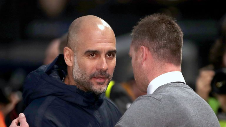 Manchester City manager Pep Guardiola and Newport County manager Michael Flynn shake hands ahead of the FA Cup fifth round match at Rodney Parade, Newport. PRESS ASSOCIATION Photo. Picture date: Saturday February 16, 2019. 