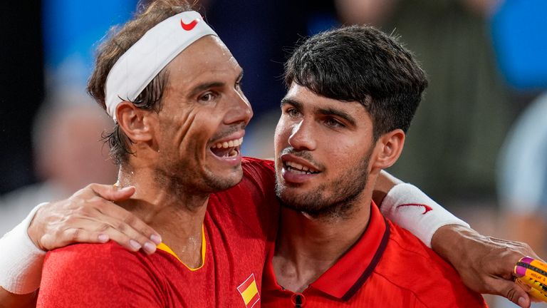 Rafael Nadal, left, and Carlos Alcaraz of Spain react after losing against Austin Krajicek and Rajeev Ram of the USA during the men's doubles quarter-final tennis competition at the Roland Garros stadium, at the 2024 Summer Olympics, Wednesday, July 31, 2024, in Paris, France. (AP Photo/Manu Fernandez) 