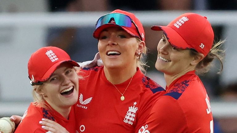 Sarah Glenn celebrates a wicket with Charlie Dean (L) and Amy Jones (R) during England's T20I series against New Zealand