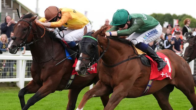Thunder Moor ridden by Billy Loughnane (centre) coming home to win the Follow @toteracing On X Racing League Race 5 Handicap at Great Yarmouth