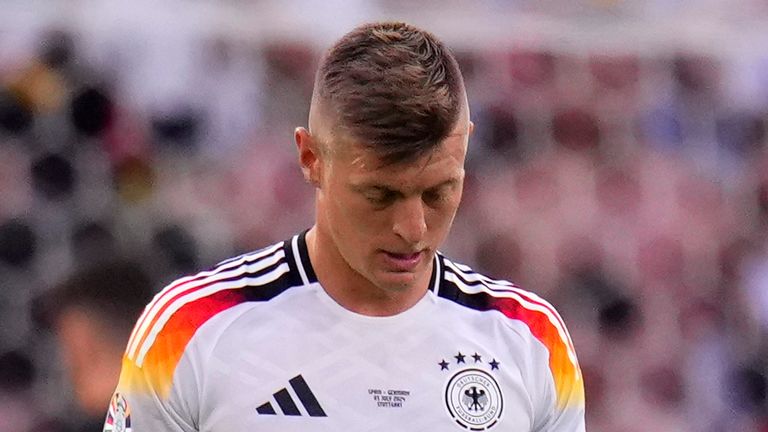 Germany's Toni Kroos walks off the pitch after a quarter final match between Germany and Spain at the Euro 2024 soccer tournament in Stuttgart, Germany, Friday, July 5, 2024. (AP Photo/Manu Fernandez)
