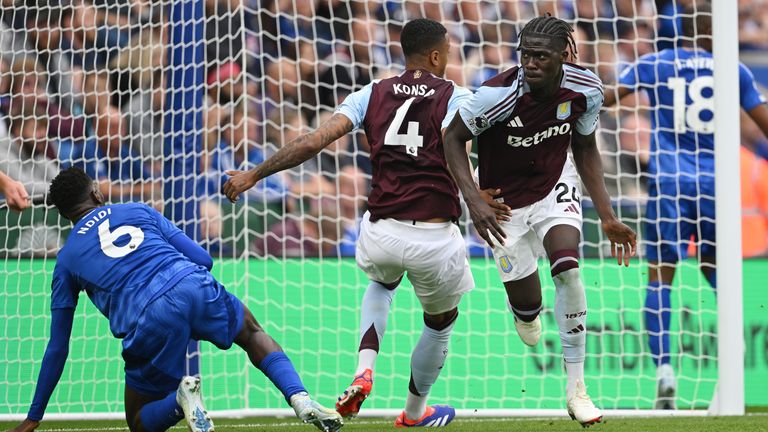 Amadou Onana wheels away after his opener for Villa