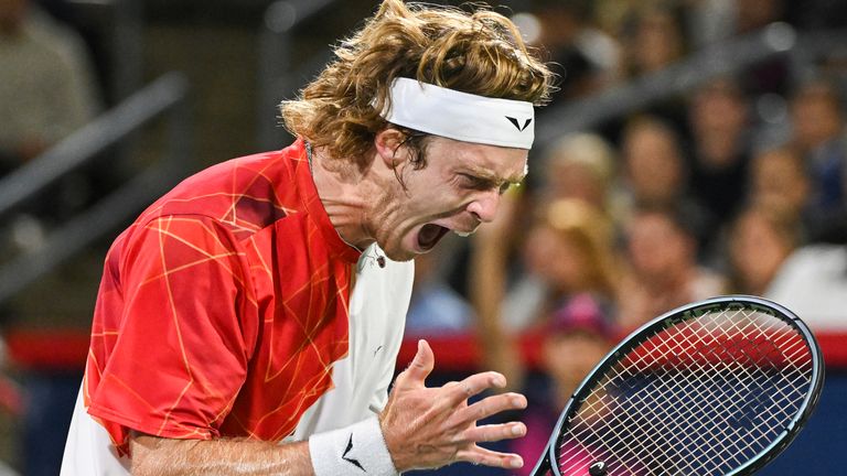 Andrey Rublev, of Russia, reacts after a shot to Alexei Popyrin, of Australia, during the final of the National Bank Open men's tennis tournament in Montreal, Monday, Aug. 12, 2024. (Graham Hughes/The Canadian Press via AP)