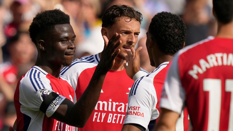 Bukayo Saka celebrates with team-mates after doubling Arsenal's lead (AP Photo/Frank Augstein)