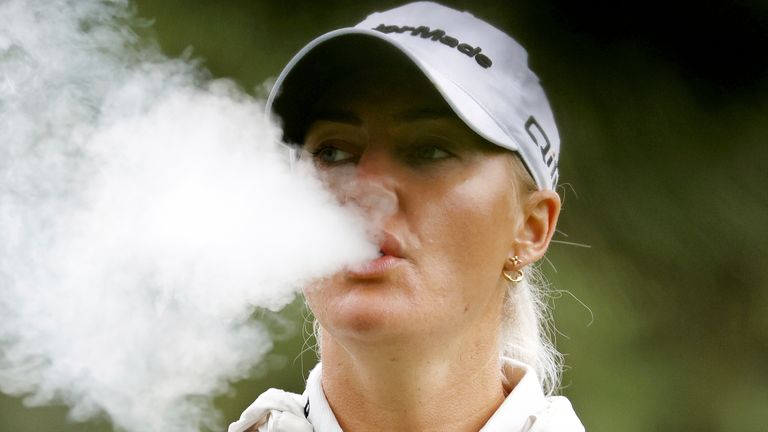 MIDLAND, MI - JUNE 28: LPGA golfer Charley Hull blows smoke while vaping on the 4th tee box during the second round of the LPGA Dow Championship on June 28, 2024, at Midland Country Club in Midland, Michigan. (Photo by Brian Spurlock/Icon Sportswire) (Icon Sportswire via AP Images)