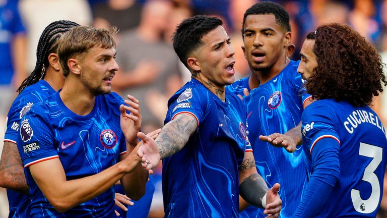 Chelsea players including Enzo Fernandez complaining to Referee during the English Premier League soccer match between Chelsea and Manchester City , at the Stamford Bridge Stadium in London, Sunday, Aug. 18, 2024. (AP Photo/Dave Shopland)