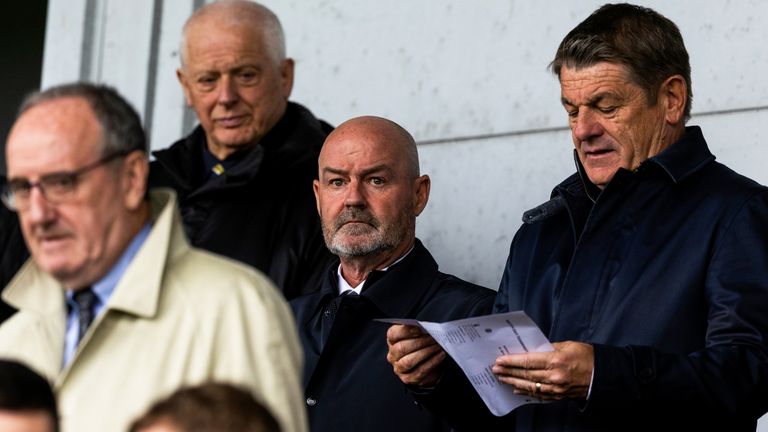 PAISLEY, SCOTLAND - AUGUST 25: Scotland Manager Steve Clarke and assistant John Carver watch on ahead of the upcoming international break during a William Hill Premiership match between St Mirren and Celtic at the SMiSA Stadium, on August 25, 2024, in Paisley, Scotland. (Photo by Craig Williamson / SNS Group)