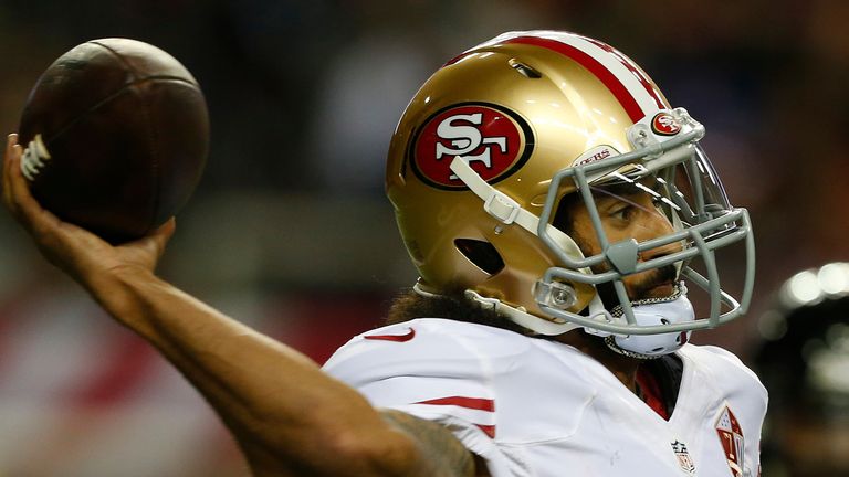 San Francisco 49ers quarterback Colin Kaepernick (7) works against the Atlanta Falcons during the second half of an NFL football game, Sunday, Dec. 18, 2016, in Atlanta. (AP Photo/Butch Dill) 