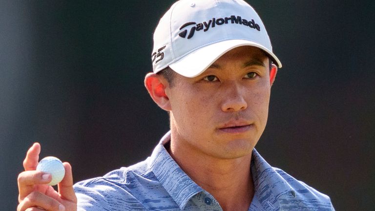 Collin Morikawa waves to the crowd after making his putt on eight during the third round of the Tour Championship golf tournament, Saturday, Aug. 31, 2024, in Atlanta. (AP Photo/Jason Allen) 