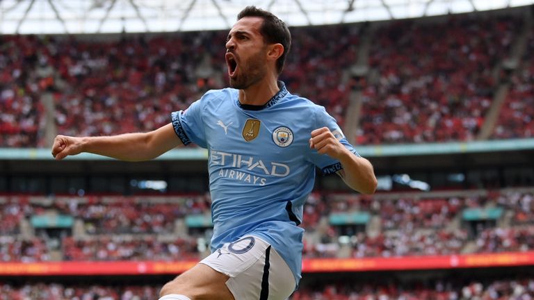 Bernardo Silva celebrates after scoring a late equaliser for Man City in the Community Shield