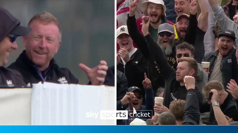 A fan takes a one-handed catch at the Old Trafford Cricket Ground