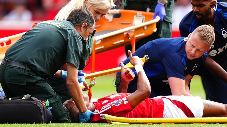 Nottingham Forest's Danilo gives a thumbs up while he receives treatment for an injury