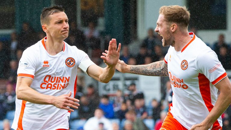 Dundee United's David Babunski (left) celebrates scoring to make it 1-0 with teammate Kevin Holt