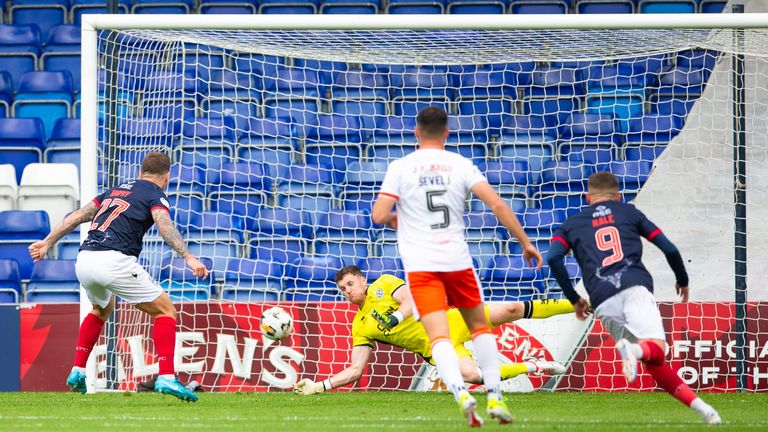 Jack Walton saves Ross County's Eamonn Brophy's penalty