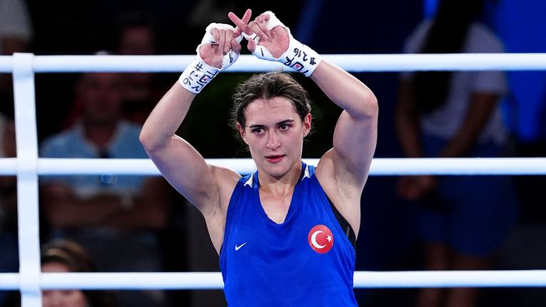 Turkey's Esra Yildiz Kahraman does an 'X' sign with their hands following defeat to Chinese Taipei's Lin Yu-Ting