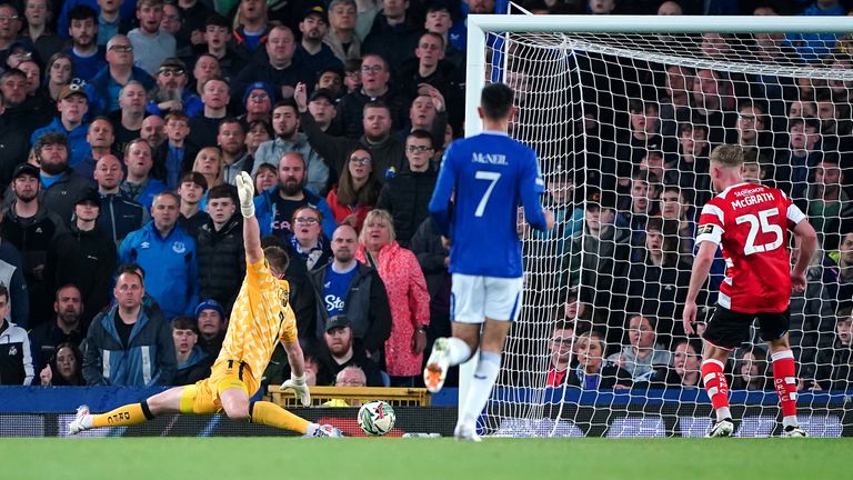 Doncaster goalkeeper Ian Lawlor attempts to make a save against Everton in the Carabao Cup.