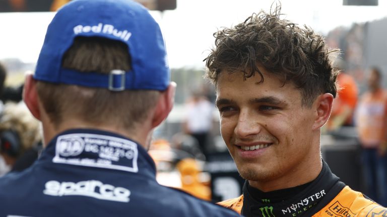 CIRCUIT ZANDVOORT, NETHERLANDS - AUGUST 24: Pole man Lando Norris, McLaren F1 Team, debriefs with Max Verstappen, Red Bull Racing, in Parc Ferme during the Dutch GP at Circuit Zandvoort on Saturday August 24, 2024 in North Holland, Netherlands. (Photo by Sam Bloxham / LAT Images)