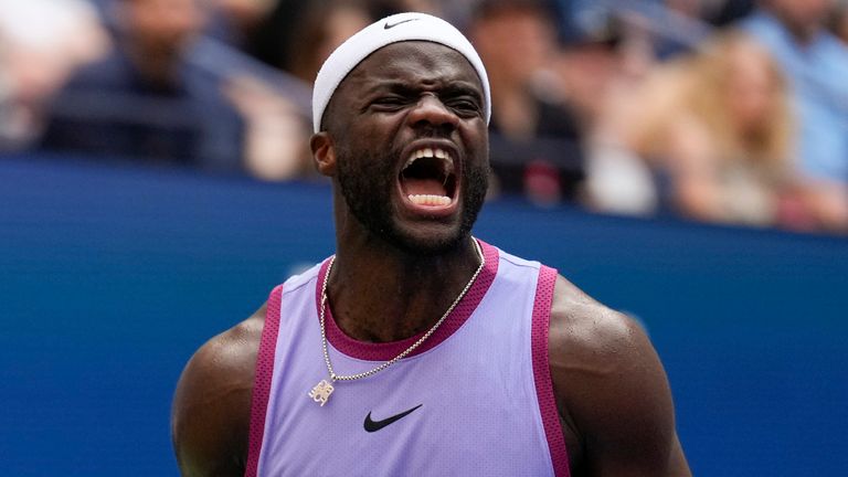 Frances Tiafoe, of the United States, reacts after scoring a point against Ben Shelton, of the United States, during the third round of the U.S. Open tennis championships, Friday, Aug. 30, 2024, in New York. (AP Photo/Seth Wenig)