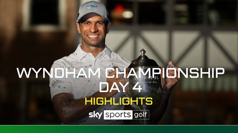 Aaron Rai, of England, poses with the trophy after winning the Wyndham Championship golf tournament in Greensboro, N.C., Sunday, Aug. 11, 2024. (AP Photo/Chuck Burton)
