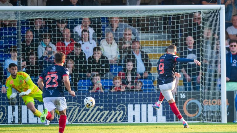 DINGWALL, SCOTLAND - AUGUTS 31: Ross County's Ronan Hale has a penalty saved by Aberdeen's Dimitar Mitov during a William Hill Premiership match between Ross County and Aberdeen at the Global Energy Stadium, on August 31, 2024, in Dingwall, Scotland. (Photo by Mark Scates / SNS Group)