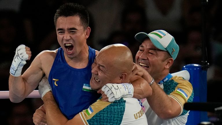 Uzbekistan's Hasanboy Dusmatov reacts after defeating France's Billal Bennama in their men's 51 kg final boxing match at the 2024 Summer Olympics, Thursday, Aug. 8, 2024, in Paris, France. (AP Photo/Ariana Cubillos)