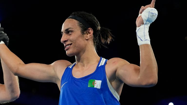 Algeria's Imane Khelif celebrates after defeating Thailand's Janjaem Suwannapheng in their women's 66 kg semifinal boxing match at the 2024 Summer Olympics, Tuesday, Aug. 6, 2024, in Paris, France. (AP Photo/John Locher)