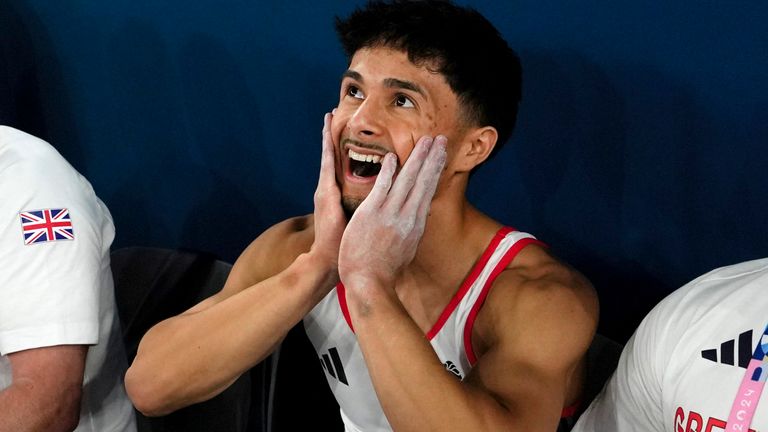 Jake Jarman of Great Britain reacts after seeing his score in the men's gymnastics floor finals