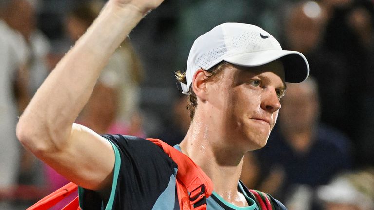 Jannik Sinner of Italy waves to crowd following his loss to Andrey Rublev of Russia in their quarter-final match at the National Bank Open tennis tournament in Montreal, Saturday, August 10, 2024. (Graham Hughes/The Canadian Press via AP)