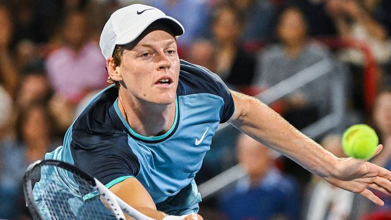 Jannik Sinner, of Italy, plays a shot to Andrey Rublev, of Russia, during their quarterfinal match at the National Bank Open tennis tournament in Montreal, Saturday, Aug. 10, 2024. (Graham Hughes/The Canadian Press via AP)