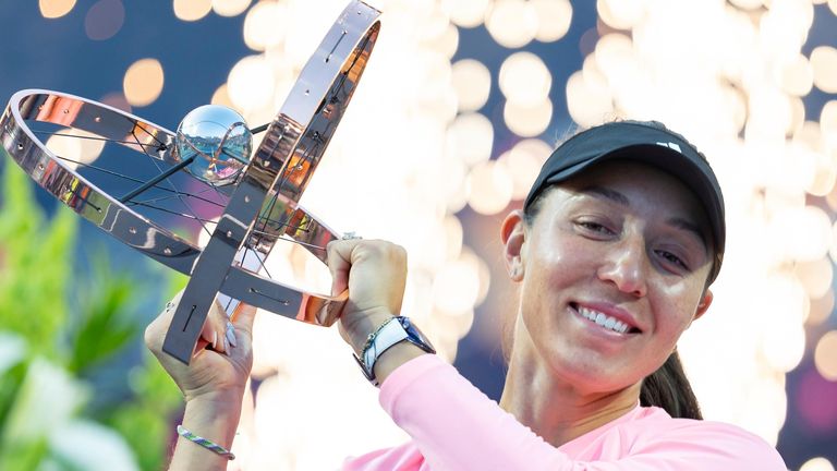 TORONTO, ON - AUGUST 12: Jessica Pegula of the United States lifts the championship trophy after winning the National Bank Open tournament, part of the WTA Tour, at Sobeys Stadium on August 12, 2024 in Toronto, Canada. (Photo by Julian Avram/Icon Sportswire) (Icon Sportswire via AP Images)