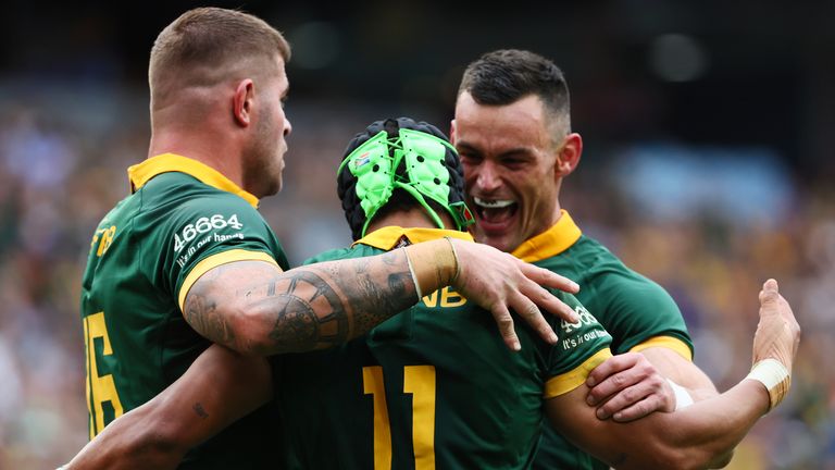 South Africa's Kurt-Lee Arendse (centre) is congratulated by team-mates after scoring a try against Australia in The Rugby Championship (Associated Press)