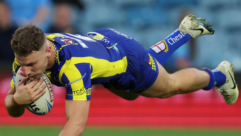 Picture by John Clifton/SWpix.com - 17/08/2024 - Rugby League - Betfred Super League Magic Weekend - Warrington Wolves v Leeds Rhinos - Elland Road, Leeds, England -
Warrington Wolves' George Williams scores a try