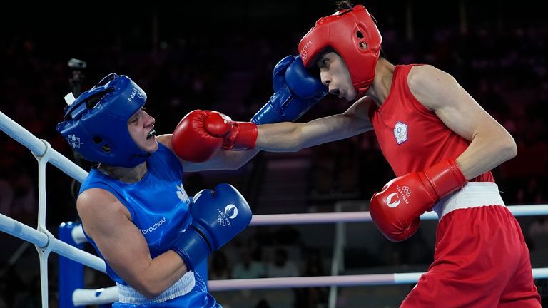 Taiwan's Lin Yu-ting, right, fights Poland's Julia Szeremeta in their women's 57 kg final boxing match at the 2024 Summer Olympics, Saturday, Aug. 10, 2024, in Paris, France. (AP Photo/John Locher)