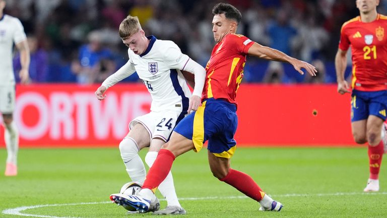 Martin Zubimendi tackles England's Cole Palmer in the Euro 2024 final. 