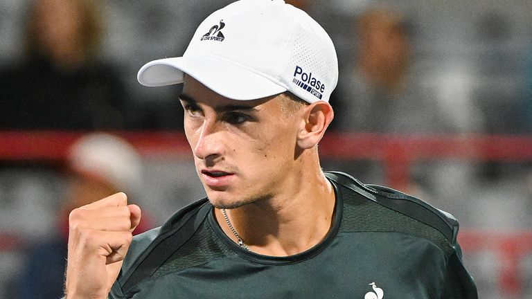 Matteo Arnaldi, of Italy, reacts after a shot during his quarterfinal match against Kei Nishikori, of Japan, at the National Bank Open tennis tournament in Montreal, Saturday, Aug. 10, 2024. (Graham Hughes/The Canadian Press via AP) 