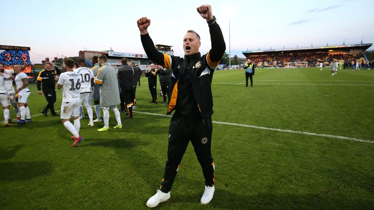 Newport County players and manager Michael Flynn (centre) celebrate their win during the Sky Bet League Two Play-off, Semi Final Second Leg match at the One Call Stadium, Mansfield.