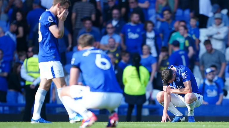 Everton's Michael Keane (right) and team-mates look dejected following defeat to Bournemouth