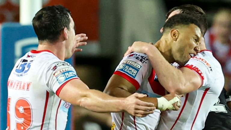 Picture by Paul Currie/SWpix.com - 08/08/2024 - Rugby League - Betfred Super League Round 21 - St Helens v Salford Red Devils - The Totally Wicked Stadium, St Helens, England - St Helens' Moses Mbye scores the golden point and celebrates