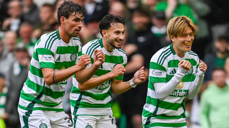 Celtic's Nicolas Kuhn celebrates with Matt O'Riley and Kyogo Furuhashi after scoring to make it 3-0