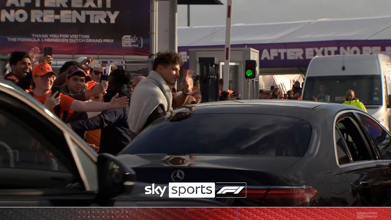 Lando Norris waving