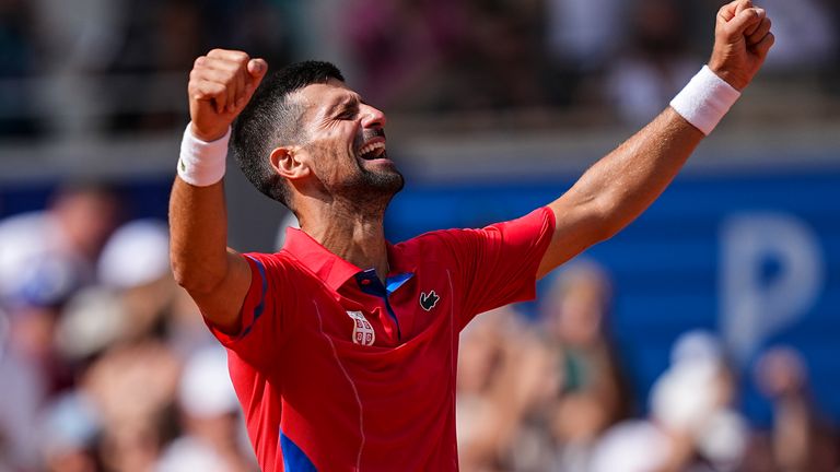 Novak Djokovic of Serbia celebrates his victory against Carlos Alcaraz of Spain during the men's singles gold medal match on Court Philippe-Chatrier at Roland-Garros stadium during the Paris 2024 Olympic Games on August 4, 2024 in Paris, France. AFP7 04.08.2024 (Europa Press via AP)