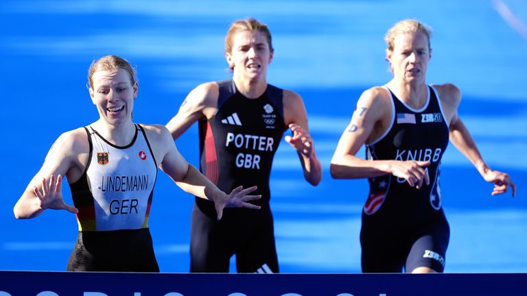 Paris 2024 Olympic Games - Day Ten
Updating caption - Great Britain have been downgraded from silver to bronze in the mixed relay following a review of the photo finish by race officials. Great Britain's Beth Potter (centre) races to the line to claim bronze, alongside Germany's Laura Lindemann (left) and USA's Taylor Knibb (right) during the Mixed Relay Triathlon at the Pont Alexandre III on the tenth day of the 2024 Paris Olympic Games in France. Picture date: Monday August 5, 2024.