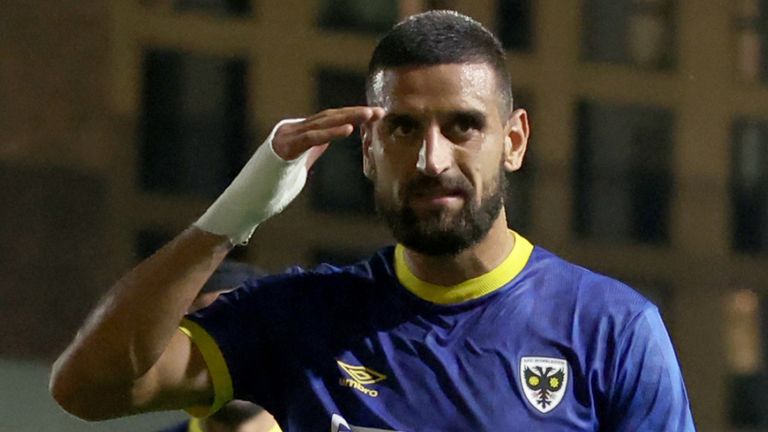 Omar Bugiel celebrates his equaliser for AFC Wimbledon against Ipswich.